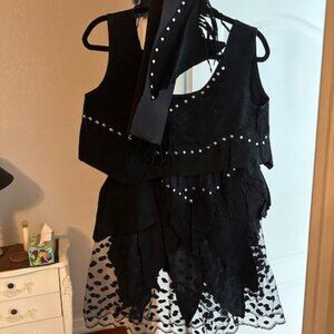 Black leather and lace skirt and top
